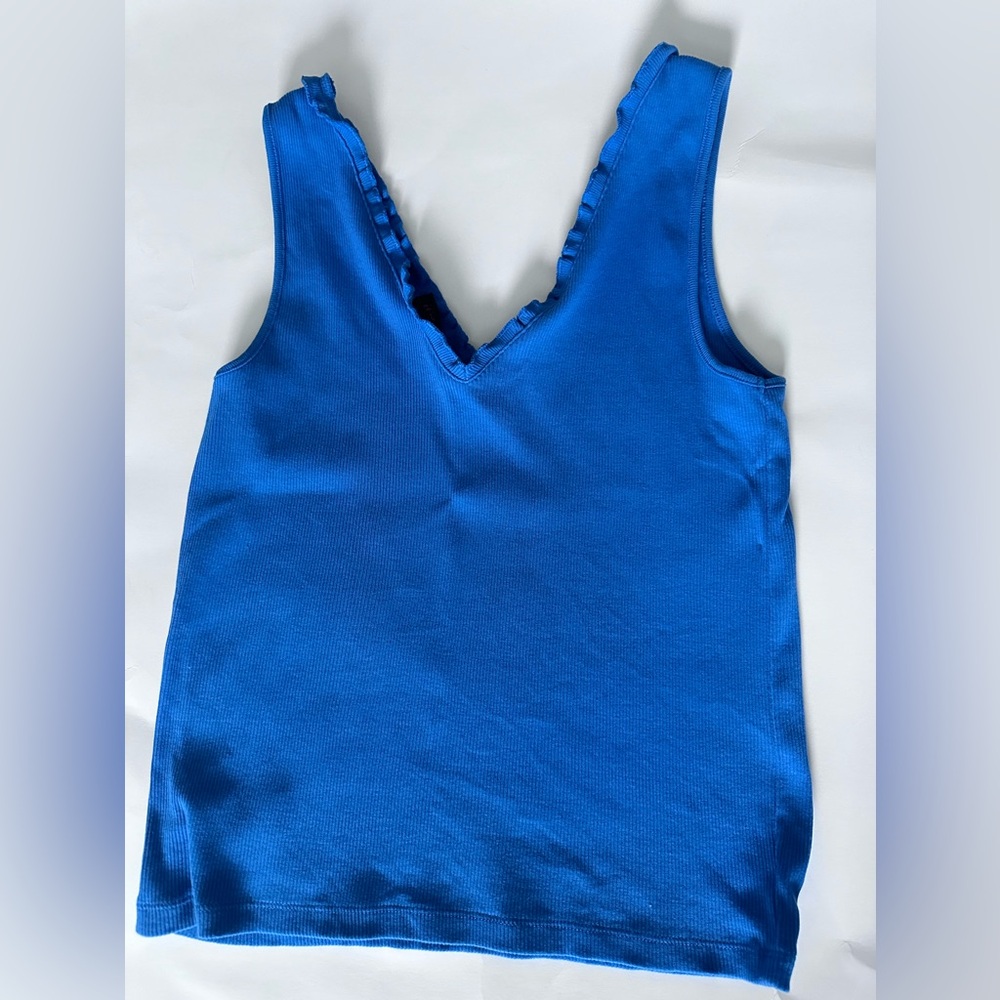 Ralph Lauren blue ribbed tank top with a ruffled V-neckline.